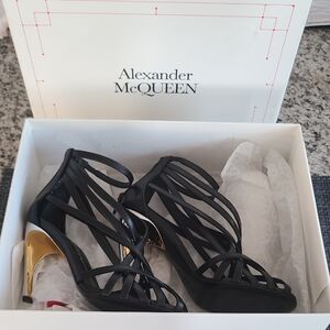 Alexander McQueen Strappy Black Heels with Gold Accent